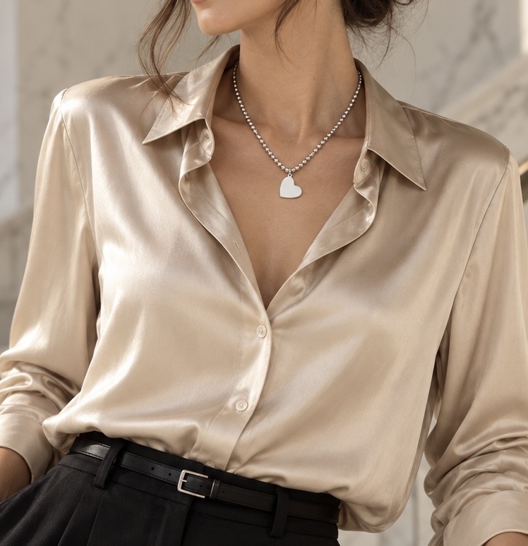 Small silver Petite Heart Beaded Necklace worn with its polished beaded chain